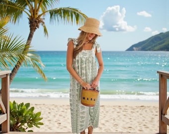 Nouvelle robe Kyra disponible en longueur midi ou mini, avec un long imprimé floral avec un décolleté profond.