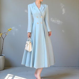 green emerald velvet dress Fitted and Flared Coat with Pleated Back in Blue and Pink main image 0