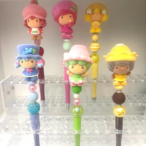 Pennetjes met een fluwelen afwerking, geïnspireerd op Strawberry Shortcake & Friends