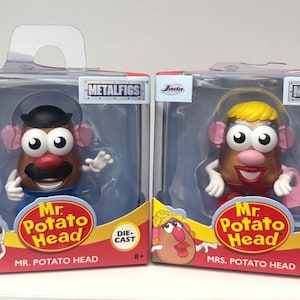 Sr. e Sra. Cabeça de Batata em Metalfigs