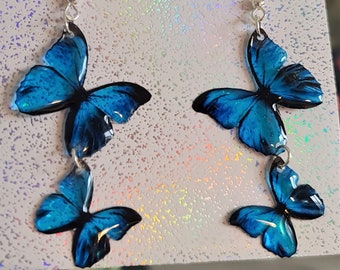 Blue Morpho butterfly dangling resin earrings