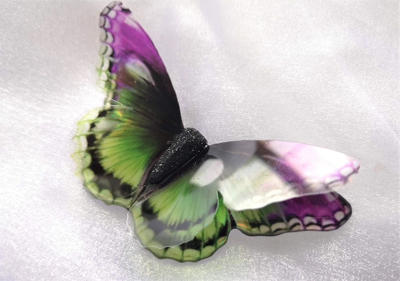 Holographic purple butterfly hanger.