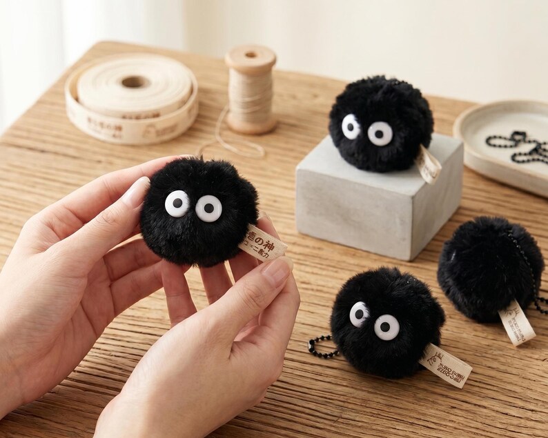 Professional product photo of a Soot Sprite plushie set featuring a buy 6 get 2 free discount offer for collectors.