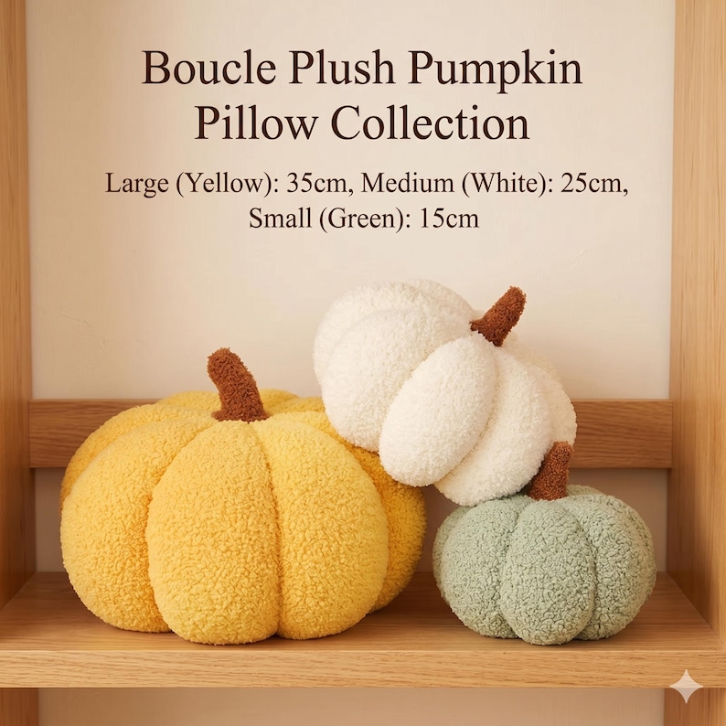 Three textured boucle pumpkin pillows in yellow, white, and sage green displayed on a wooden shelf with clear text showing sizes: Large Yellow 35cm, Medium White 25cm, and Small Green 15cm. Perfect for autumn home decor.