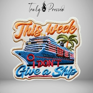 May include: An embroidered patch featuring a cruise ship, a palm tree, and the text "This week I DON'T Give a Ship". The ship is blue with red and white accents, the palm tree is green, and the text is in orange and blue thread on a white background.