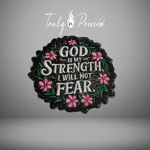 May include: Embroidered patch with the text "GOD IS MY STRENGTH, I WILL NOT FEAR." The patch is circular, with a black border and pink flower accents. The words are in white.