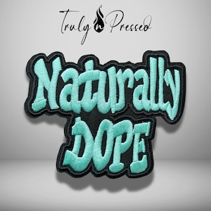 May include: An embroidered patch featuring the text Naturally DOPE in light teal thread with a black border. Above the patch, the text Truly n Pressed is written in black script with a small flame icon replacing the letter n.
