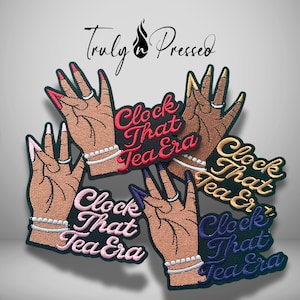 May include: Four embroidered patches featuring hands with manicured nails, bracelets, and rings. Each patch displays the text "Clock That Tea Era" in different colors including red, pink, gold, and purple, with the brand name Truly n Pressed.