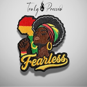 May include: An embroidered patch featuring a person with an afro hairstyle wearing a headwrap in red, yellow, and green. The design includes a raised fist, a map of Africa in the background, and the word Fearless in yellow script text.