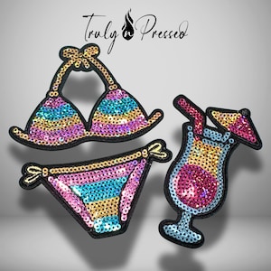 May include: Two embroidered patches featuring a sequined bikini top and bottom set and a sequined tropical cocktail glass with a small umbrella. The bikini and cocktail are decorated with vibrant pink, yellow, and blue sequins. Truly Pressed text.