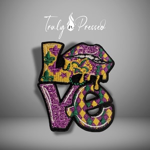 May include: Embroidered patch spelling "Love" with a Mardi Gras theme. The "L" and "O" are yellow with purple fleur-de-lis and dripping gold accents. The "V" and "E" are purple with a diamond pattern. The patch has a black border.