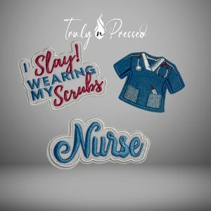May include: Three embroidered patches: one reads "I Slay! Wearing My Scrubs" in red and blue, another is a blue scrub top with a stethoscope, and the third says "Nurse" in blue script. The patches are on a gray background.