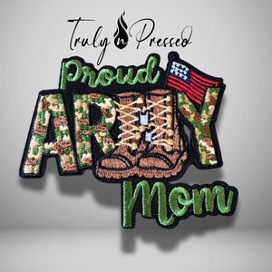 May include: Embroidered patch with the words "Proud Army Mom" in green and camouflage lettering. The patch features brown combat boots, an American flag, and the text "Truly n Pressed" in black script.