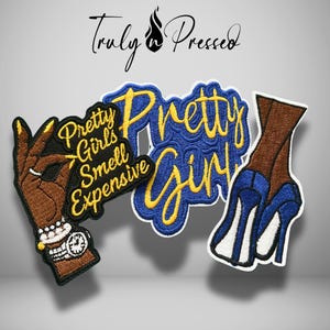 May include: Three embroidered patches featuring a hand with gold nails and a watch, the text Pretty Girls Smell Expensive, the text Pretty Girls in yellow and blue, and a pair of legs wearing blue high-heeled shoes with white accents.