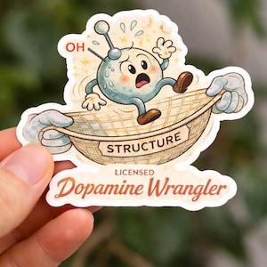May include: A sticker featuring a cartoon illustration of a blue atom character with a surprised expression, holding onto a net labeled "STRUCTURE." The text "LICENSED Dopamine Wrangler" is below.