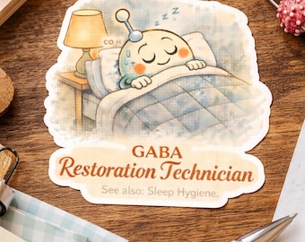 May include: A sticker featuring a cartoon character sleeping in bed with a lamp on a nightstand. The sticker has the text "GABA Restoration Technician" and "See also: Sleep Hygiene."