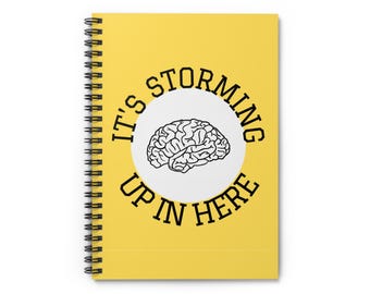 Está azotando una tormenta aquí (Cuaderno espiral con líneas punteadas)