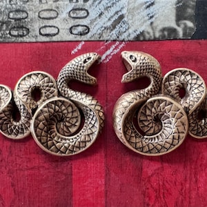 Left and Right Facing Brass Snakes, Brass Ox