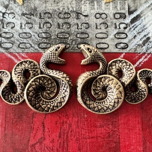 Left and Right Facing Brass Snakes, Brass Ox