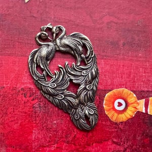 Brass Peacock in Brass Ox finish, 56mm x 33mm