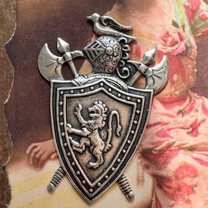 Brass Shield with Axes, Sterling Silver Finish