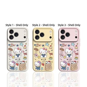 May include: Three phone cases with a Hello Kitty design. The cases are white, yellow, and pink. Each case features a cartoon Hello Kitty, stars, hearts, and food illustrations. The text "Hello Kitty" is visible on each case.
