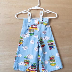 Vtg Baby Schlaghose mit Frühlingsmotiv