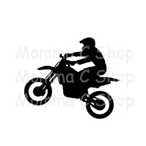 May include: Black silhouette of a person riding a motocross bike. The rider is wearing a helmet and is in mid-air, performing a stunt. The bike has large wheels and is angled upwards. The image is set against a white background.