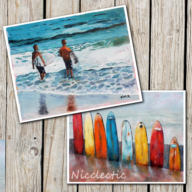 May include: A painting of two surfers standing on a beach with their surfboards. The painting is in a bright, colourful style with a blue sky and ocean. The painting is signed "Pink R".