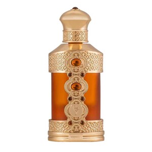 May include: An ornate perfume bottle with a gold-colored cap and base. The bottle has a cylindrical shape with a frosted amber-colored glass body. Gold filigree and amber-colored jewels adorn the bottle, adding to its luxurious appearance.