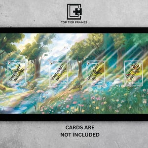 May include: A black framed display featuring a colourful landscape painting with a stream, trees, and flowers. Four clear card holders are visible, each with the text "CARD IS NOT INCLUDED". The top of the frame reads "TOP TIER FRAMES", and the bottom reads "CARDS ARE NOT INCLUDED".