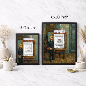 May include: Two framed art prints, one 12.7 x 17.8 cm and the other 20.3 x 25.4 cm, depict a painting of a man in a straw hat holding a palette. The painting includes a trading card slot. The frames are black.