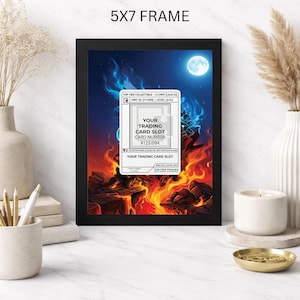 May include: A black 5x7 frame displays a fantasy-themed trading card. The card features a fiery landscape with a full moon and blue flames. Text on the card reads "Your Trading Card Slot" and "Card Number #125/094".