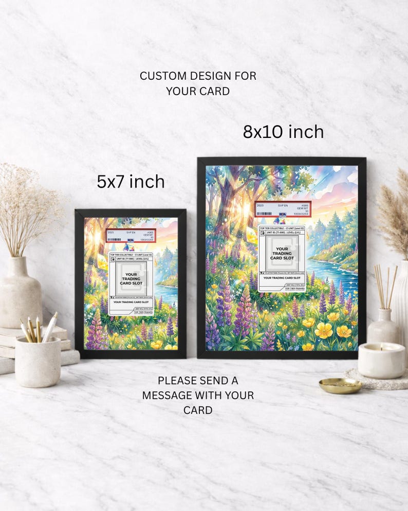 May include: Two framed art prints, 12.7 x 17.8 cm and 20.3 x 25.4 cm, with a landscape scene of a river, trees, and flowers. Each frame has a trading card slot label. Text reads: "CUSTOM DESIGN FOR YOUR CARD" and "PLEASE SEND A MESSAGE WITH YOUR CARD."