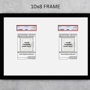 May include: Black 10x8 inch frame with two trading card slots. Each slot has a space for a card and text that reads "YOUR TRADING CARD SLOT". The top of each slot has a red and white label with text and a barcode.