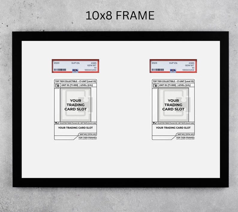 May include: Black 10x8 inch frame with two trading card slots. Each slot has a space for a card and text that reads "YOUR TRADING CARD SLOT". The top of each slot has a red and white label with text and a barcode.