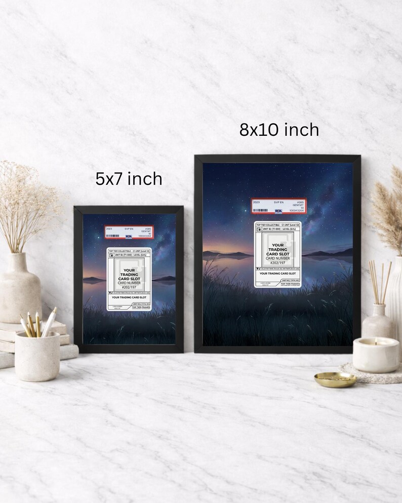 May include: Two framed prints, one 5x7 inches and the other 8x10 inches, featuring a serene landscape with a night sky and water. Each print includes a white label with the text "YOUR TRADING CARD SLOT CARD NUMBER #000/197".