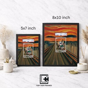 May include: Two black rectangular frames containing prints of The Scream painting, each featuring a centered trading card slab. The frames are labeled 5x7 inch and 8x10 inch. Text below reads TOP TIER FRAMES and CARD IS NOT INCLUDED.