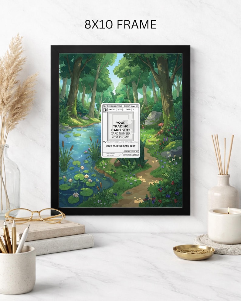 May include: An 8x10 inch framed print featuring a serene forest scene with a stream, path, and lush greenery. The artwork includes a trading card slot graphic with text. The frame is black.