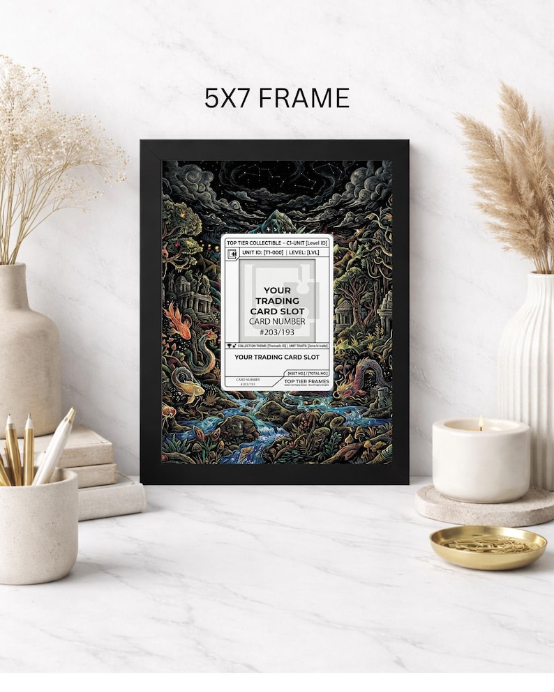 May include: A black 5x7 frame displays a colorful fantasy illustration with a trading card slot. The artwork features a detailed landscape with creatures, trees, and a river. The text on the card reads "YOUR TRADING CARD SLOT CARD NUMBER #203/193".