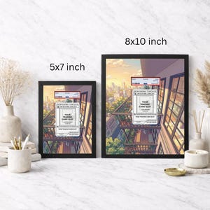 May include: Two framed art prints, one 5x7 inches and the other 8x10 inches, featuring an anime-style illustration of a balcony scene with trading card slots. The artwork has a warm color palette with a cityscape backdrop.