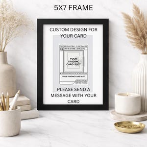 May include: A black 5x7 frame with the text "CUSTOM DESIGN FOR YOUR CARD." The frame holds a trading card slot design. The text "PLEASE SEND A MESSAGE WITH YOUR CARD" is also visible.