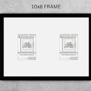 May include: A black framed print with the text "10x8 FRAME" at the top. The print features two trading card slots with text that reads "TOP TIER COLLECTIBLE" and "YOUR TRADING CARD SLOT".