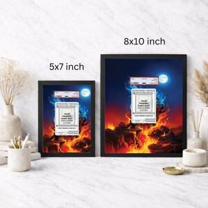 May include: Two framed art prints, 5x7 inches and 8x10 inches, feature a surreal scene with a trading card graphic. The artwork depicts a card slot with the text "YOUR TRADING CARD SLOT CARD NUMBER #125/054" set against a fiery landscape and a night sky with a full moon.
