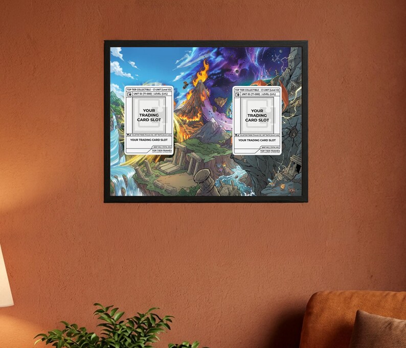 May include: Framed artwork featuring a fantasy landscape with waterfalls, mountains, and a volcano. Two white card slots are overlaid on the image, each labeled "YOUR TRADING CARD SLOT". The artwork is in a black frame.