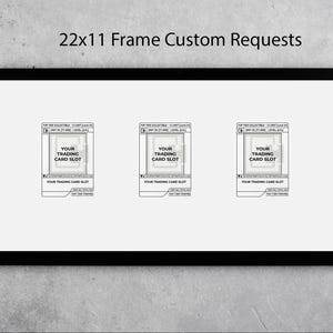 May include: A black framed display with the text "22x11 Frame Custom Requests" at the top. The frame holds three trading card slots, each labeled "Your Trading Card Slot". The frame measures 22 inches by 11 inches.