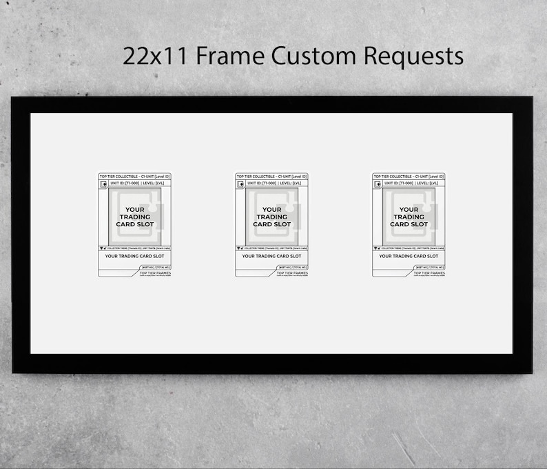 May include: A black framed display with the text "22x11 Frame Custom Requests" at the top. The frame holds three trading card slots, each labeled "Your Trading Card Slot". The frame measures 22 inches by 11 inches.