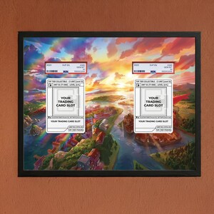 May include: A framed artwork featuring a vibrant landscape with a river and buildings under a colorful sky. The frame holds two trading card slots with text that reads "YOUR TRADING CARD SLOT". Above the slots are labels with text and barcodes.