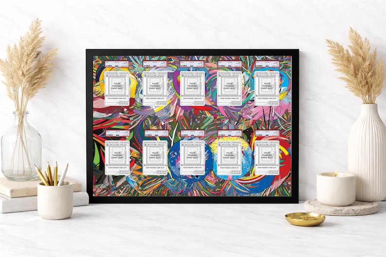 May include: A framed artwork featuring nine trading card holders against a colourful abstract background. Each holder has a white label with the text "YOUR TRADING CARD SLOT". The artwork is in a black frame.