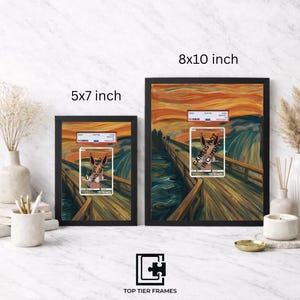 May include: Two black frames in 5x7 inch and 8x10 inch sizes, each containing a print of a bridge scene with an orange sky, featuring a central rectangular card holder with the text CARDS NOT INCLUDED. The frames are displayed on a white surface.